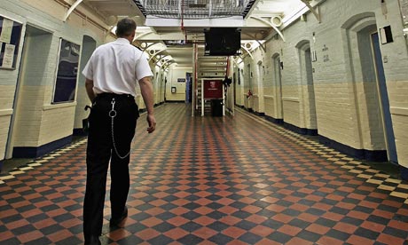Prison officer inside a wing of HMP Norwich