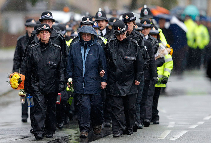 24 hours in pictures: Friends and colleagues of police officers Bone and Hughes 