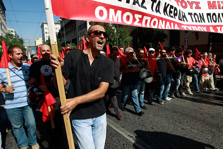 Greece protests: Supporters of the Greek Communist party march