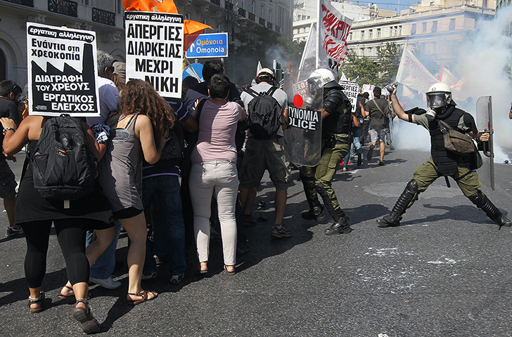 Greece protests update: Protesters clash with riot police during a a general strike