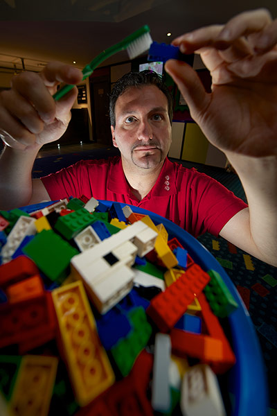 Legoland gallery: Model Maker Giorgio Pastero cleans individual lego blocks