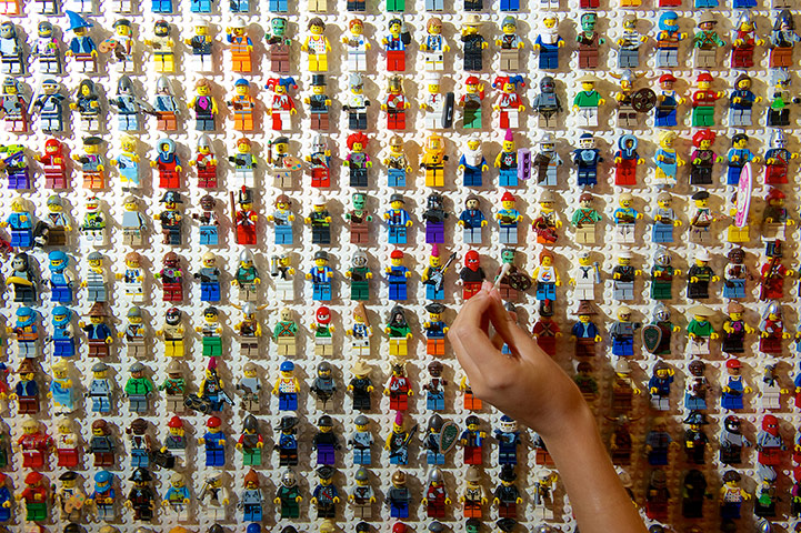 Legoland gallery: Mini figures are cleaned with a cotton wool bud