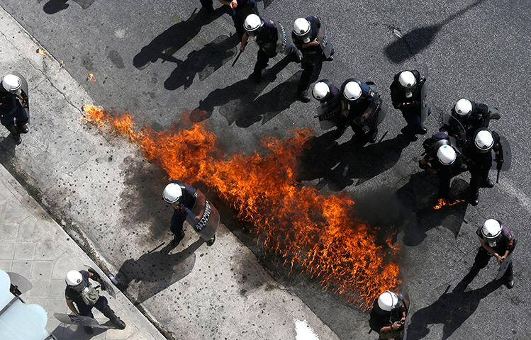 Greece protests updates: A fire bomb explodes among riot police during clashes