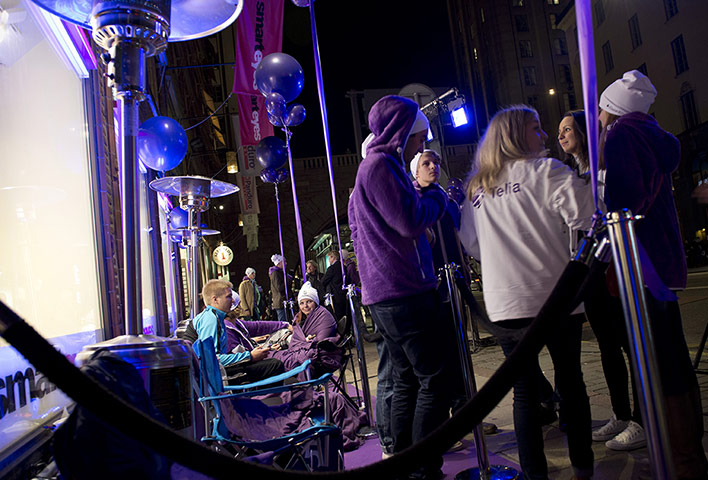 24 hours in pictures: People wait for the new iPhone 5 to go on sale in Stockholm, Sweden