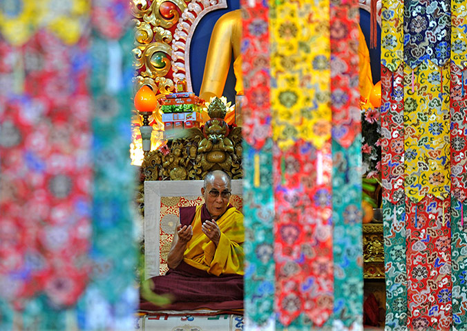 24 hours in pictures: the Dalai Lama holds a prayer meeting at the Namgyal monastery in Dharamshala, India