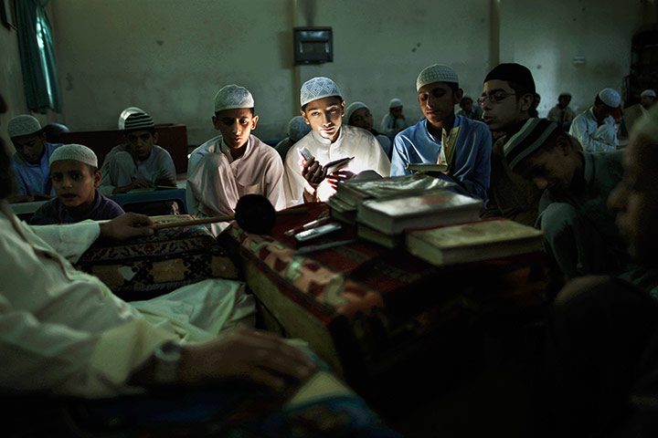 Twenty Photos: Pakistani students of a madrassa, or Islamic school