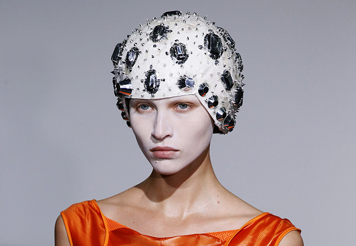 Twenty Photos: A model presents a creation by Junya Wat