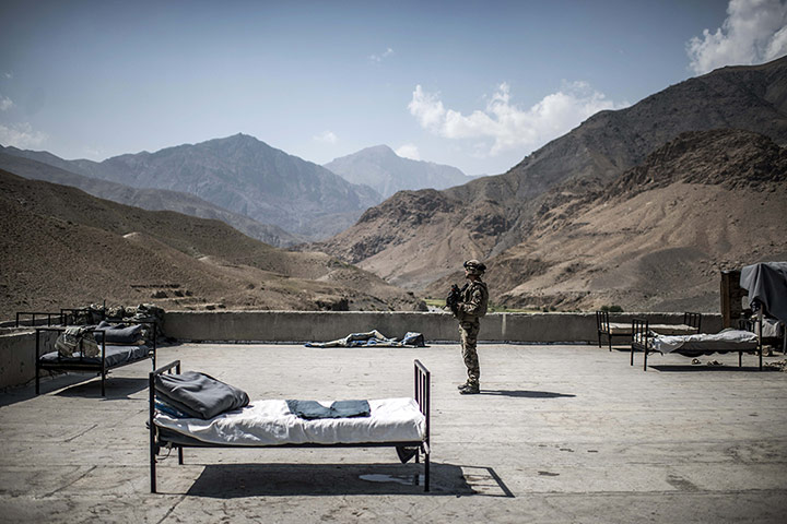 Twenty Photos: A French soldier on a rooftop of an Afghan National Police combat post