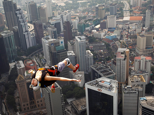 24 hours: Florian Pays gestures while leaping from Malaysia's Kuala Lumpur Tower