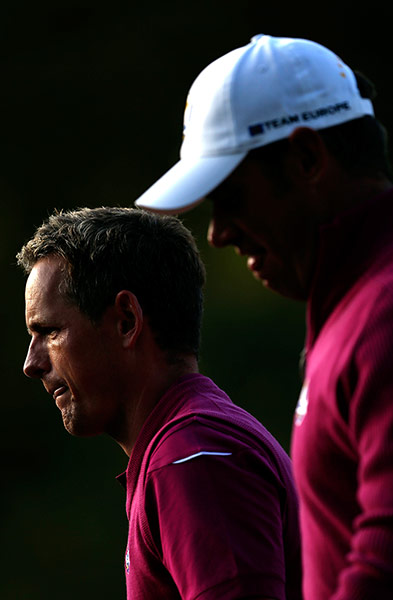 Ryder Cup day 2: Luke Donald, left, and Lee Westwood walk across the fourth green