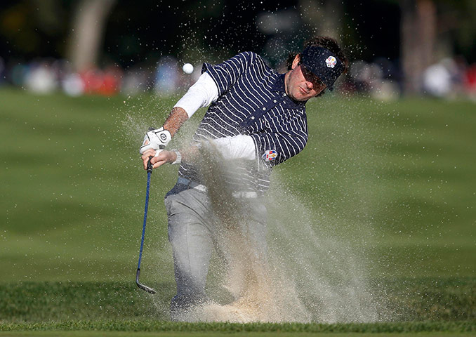 Ryder Cup day 2: Bubba Watson blasts out of a sand trap on the 9th
