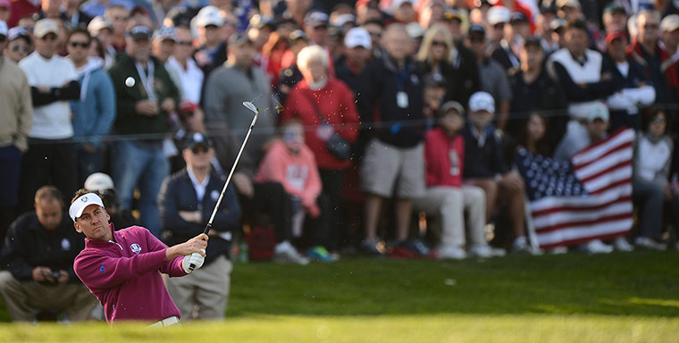 Ryder Cup day 2: Ian Poulter hits from the bunker on the 7th