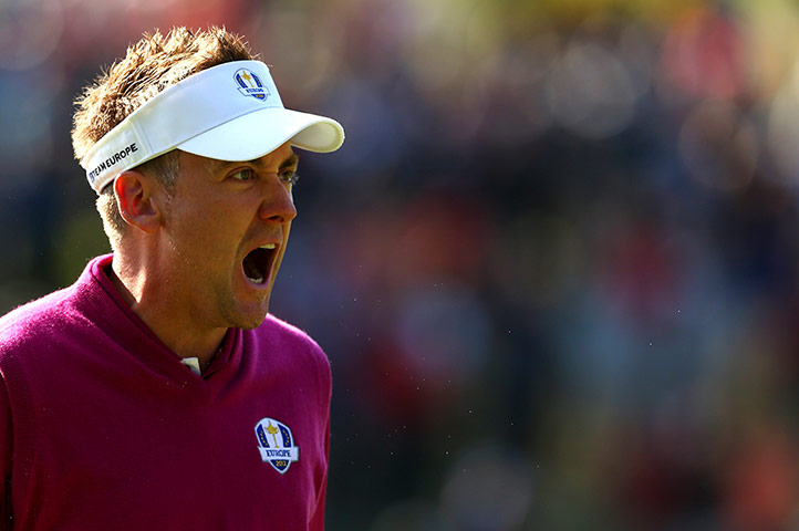 Ryder Cup day 2: Ian Poulter celebrates after holing a putt on the 12th