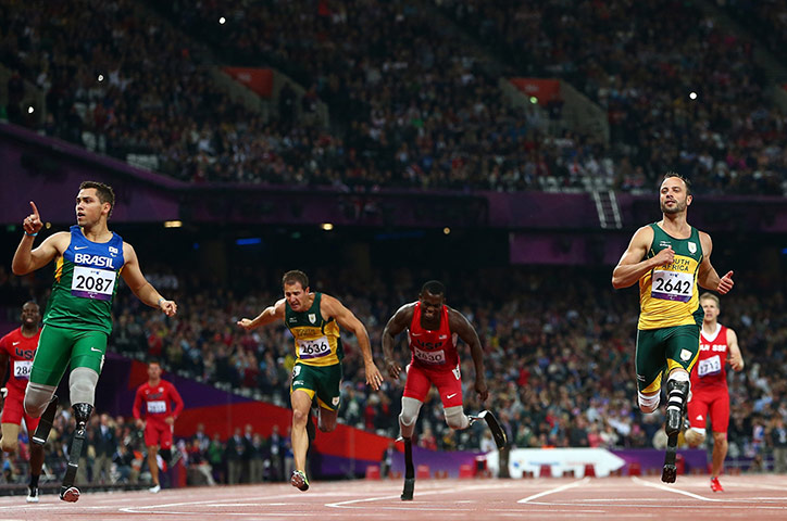 Oscar Pistorius: Alan Fonteles Cardoso Oliveira of Brazil crosses the line 