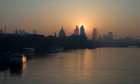 Sun rises above the City of London