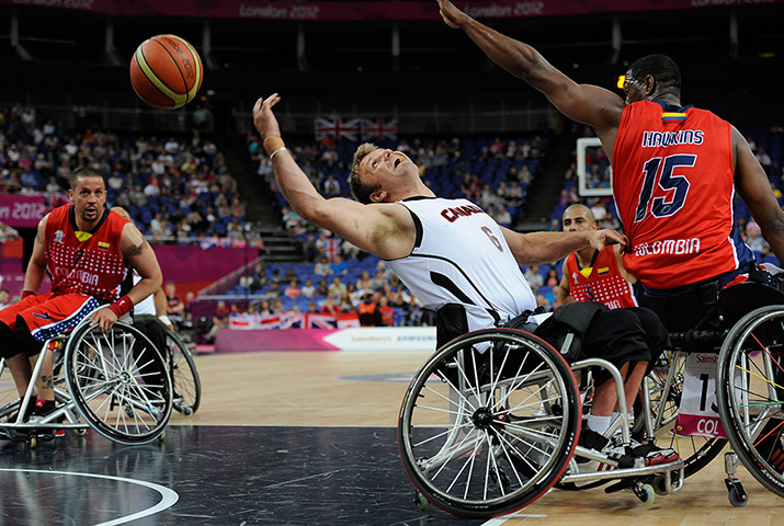 basketball gallery: Canadian Bo Hedges takes a shot arching backwards
