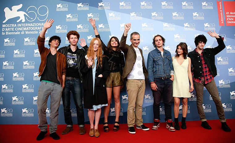 Venice film festival: French director Olivier Assayas with the cast from his film Apres Mai