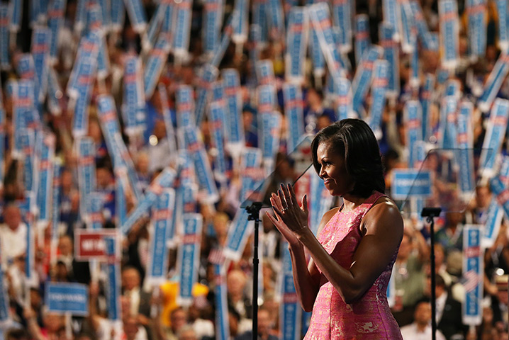 DNC session 1: First lady Michelle Obama applauds after speaking at the convention