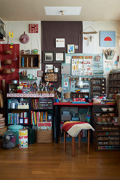 Space: Homes Feature: Wall in home with buttons and beads displayed in assorted cabinets