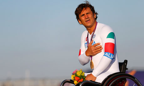 Alex Zanardi sings the Italian national anthem after winning gold at the Paralympic Games