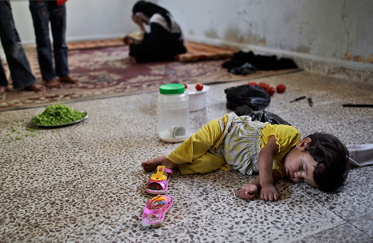 24 hours in pictures: syrian refugees from aleppo