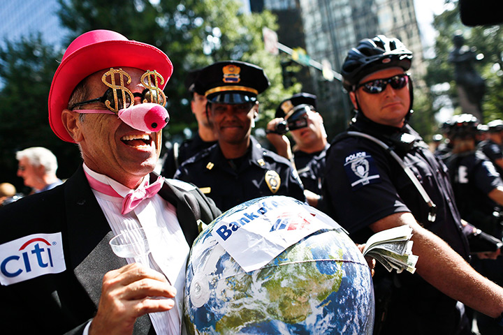 DNC day 2: A demonstrator protesting against the influence of money in politics 