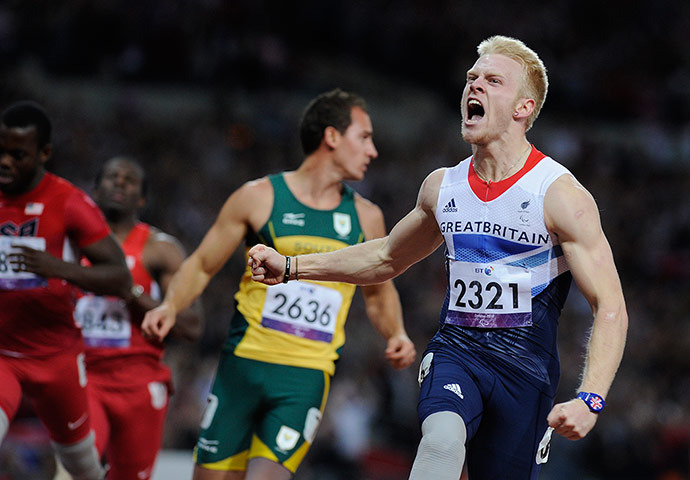 Tom Jenkins 100m: Jonnie Peacock of GB wins the race.