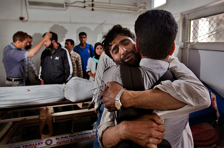 24 hours in pictures: bus accident in Kashmir