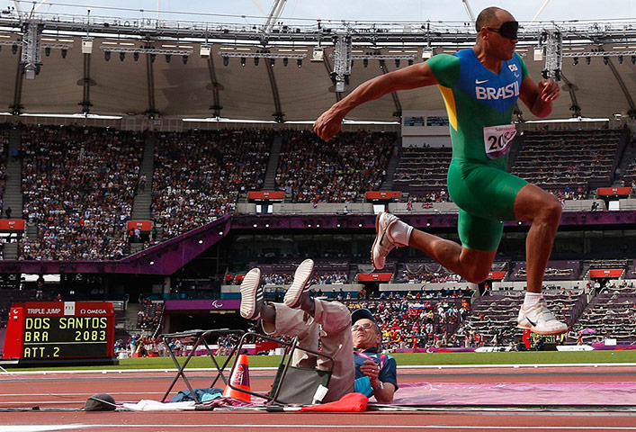 Weirdsport: Brazil's dos Santos Pereira knocks over an official 