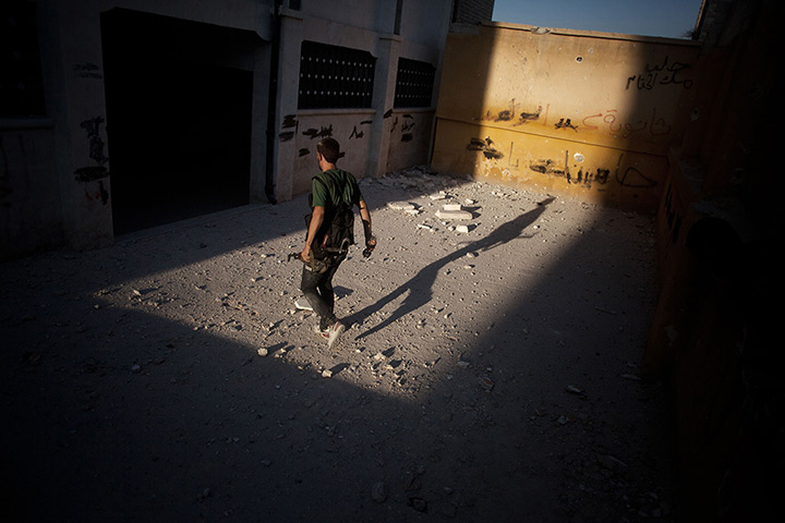 24 hours in pictures: A Free Syrian Army fighter