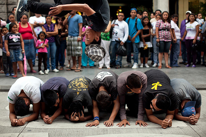24 hours in pictures: A group of teenagers perform acrobatics in Guatemala City