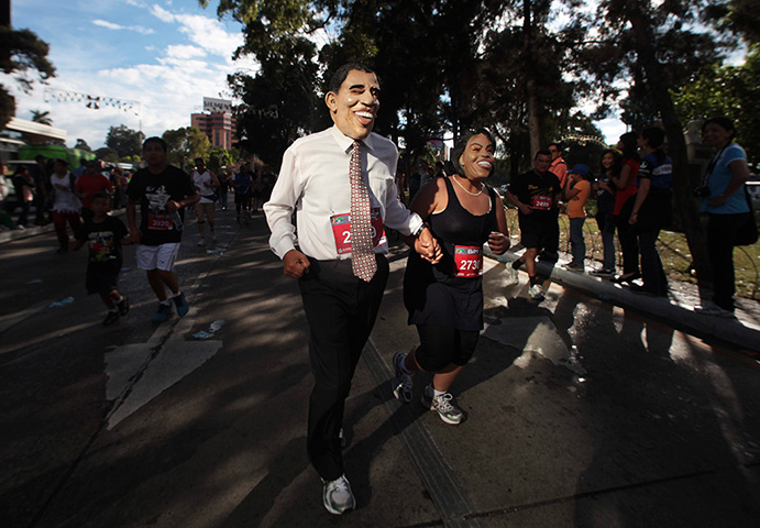 24 hours: Guatemala City, Guatemala: A couple dressed as President Obama