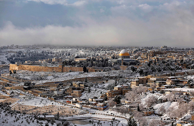 Snow in Jerusalem: Snow covers the Dome of the Rock in Jerusalem's Old City 