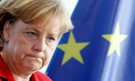 German chancellor Angela Merkel by an EU flag