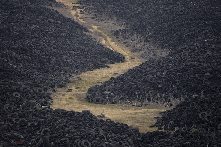 24 hours in pictures:  Wheels are stored for recycling in a field in Sesena