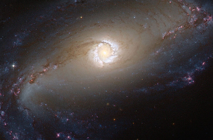 A Month in Space: the heart of the barred spiral galaxy NGC 1097