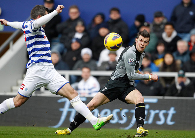 sat round up : Gareth Bale manages to get a cross ahead of Ryan Nelsen