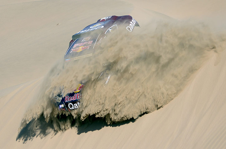 Dakar 2013: Qatar's Nasser Al-Attiyah ploughs down a dune 