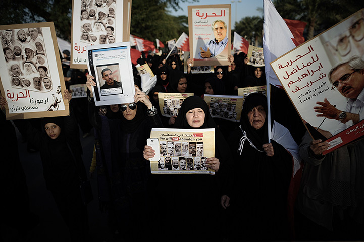 24 hours in pictures: Bahraini Shiite Muslim women take part im protest