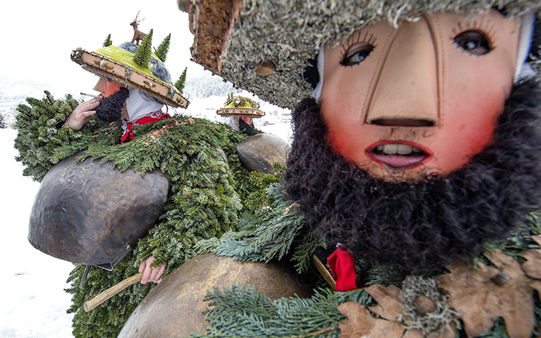 24 hours in pictures: Silvesterklaeuse' (New Year Clauses) march through the snow