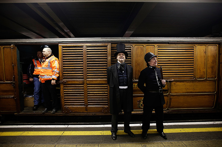 Met locomotive: Actors in period costume with underground workers