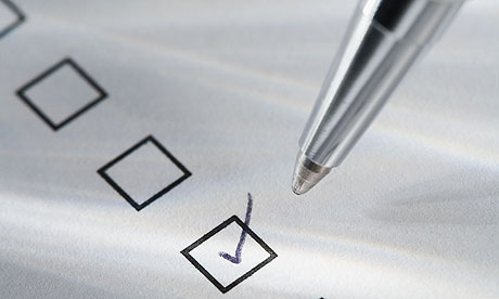 Still life of pen checking box