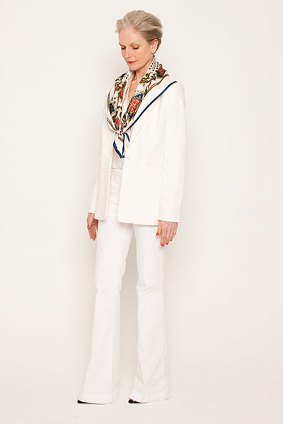 All Ages: Cream: Lisskulla wears jeans, redvalentino.com. Blazer, jaeger. Scarf, £5, rokit