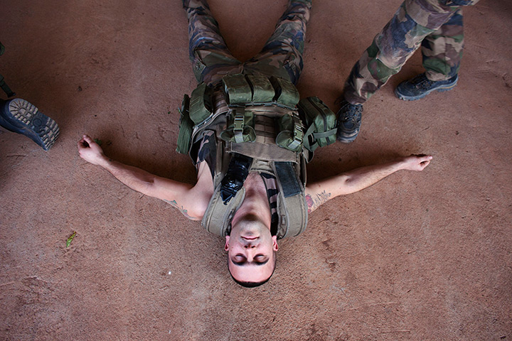 24 hours: Bamako, Mali: A French soldier lies on the ground during training