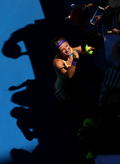 aussie oepn day 2: Defending champion Victoria Azarenka signs autographs for fans 