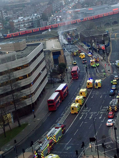 Helicopter crash: Emergency services arrive as smoke pours from the burning debris 