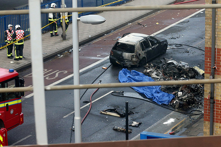 Helicopter crash: Emergency services survey the wreckage 