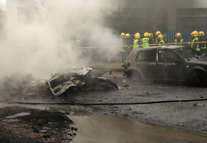 Crash aftermath: Smoking debris at the scene in Vauxhall