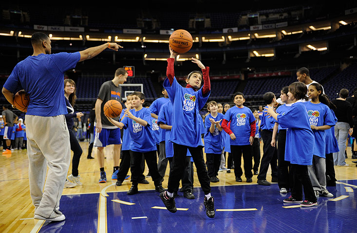 NBA training: A young girl at the NBA basketball practice