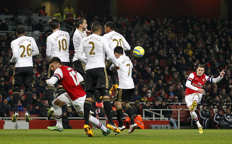 FA Cup replays 3: Thomas Vermaelen whips a free-kick over the Swansea wall